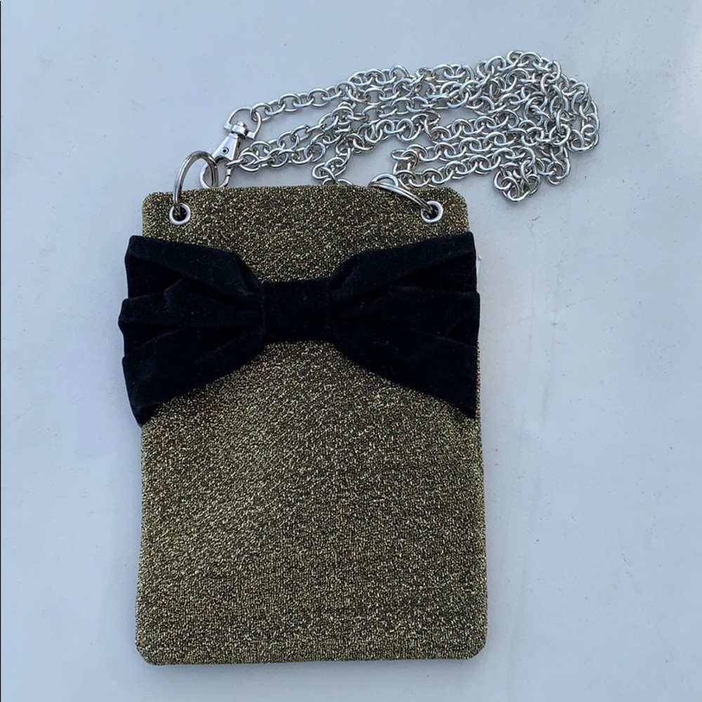 Brand new gold glitter and black bow purse